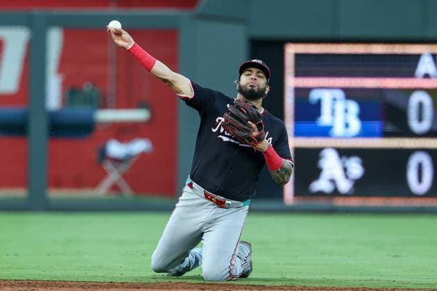 August 12, 2025: Washington Nationals second baseman Luis Garcia Jr. (2) throws to first from his knees during the third inning against the Kansas City Royals at Kauffman Stadium in Kansas City, MO. CSM Kansas City United States of America - ZUMAc04_ 20250812_zma_c04_041 Copyright: xDavidxSmithx