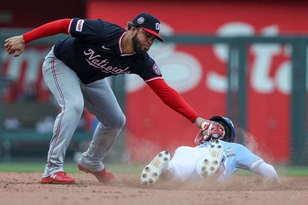 August 13, 2025: Kansas City Royals second baseman Tyler Tolbert (2) beats the tag from Washington Nationals second baseman Luis Garcia Jr. (2) to steal second during the eighth inning at Kauffman Stadium in Kansas City, MO. CSM Kansas City United States of America - ZUMAc04_ 20250813_zma_c04_161 Copyright: xDavidxSmithx