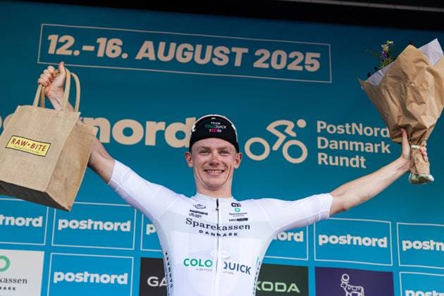 August 13, 2025, Gladsaxe, Denmark: Conrad Haugsted of Denmark and Team ColoQuick celebrates on the podium with the youth jersey after 2 stage of PostNord Danmark Rundt 2025. The second stage of the PostNord Danmark Rundt 2025 cycling race starts in Rodovre and finishing in Gladsaxe. Gladsaxe Denmark - ZUMAs197 20250813_aaa_s197_054 Copyright: xKristianxTuxenxLadegaardxBergx