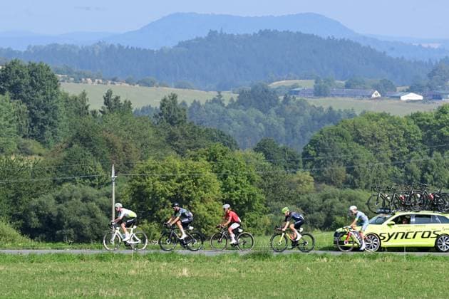 The leading group at the 1st stage of the Czech Tour cycling race Prague - Karlovy Vary, Czech Republic, on August 14, 2025. In the background Vladar hill. (CTKxPhoto SlavomirxKubes) CTKPhotoP2025081404818  CTKPhotoP2025081404818