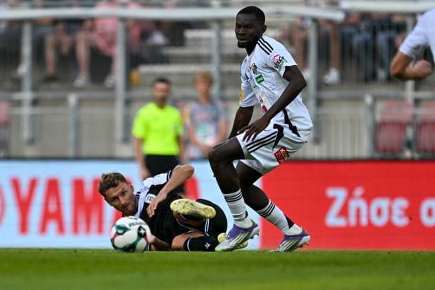 SOCCER - UEFA EL, WAC vs PAOK KLAGENFURT,AUSTRIA,14.AUG.25 - SOCCER - UEFA Europa League, qualification, Wolfsberger AC vs PAOK Thessaloniki. Image shows Fedor Chalov (PAOK) and Cheick Mamadou Diabate (WAC).  GEPAxpictures xAvnixRetkoceri