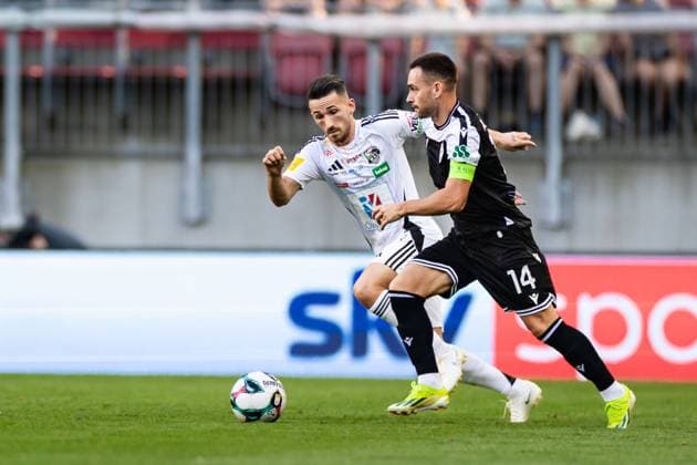 SOCCER - UEFA EL, WAC vs PAOK KLAGENFURT,AUSTRIA,14.AUG.25 - SOCCER - UEFA Europa League, qualification, Wolfsberger AC vs PAOK Thessaloniki. Image shows Donis Avdijaj (WAC) and Andrija Zivkovic (PAOK).  GEPAxpictures xMatthiasxTrinkl