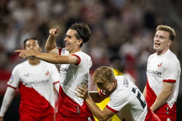 UTRECHT (l-r) Victor Jensen of FC Utrecht and Dani de Wit of FC Utrecht celebrate the 2-0 goal during the UEFA Europa League third qualifying round match between FC Utrecht and Servette FC at the Galgenwaard Stadium on August 14, 2025, in Utrecht, Netherlands. ANP KOEN VAN WEEL UEFA Europa League 2025-2026 xVIxANPxSportx xxANPxIVx 533395738 originalFilename: 533395738.jpg