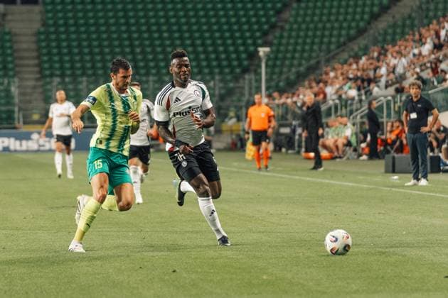 Legia Warszawa v AEK Larnaka - UEFA Europa League Hrvoje Milicevic of AEK Larnaka and Jean-Pierre Nsame of Legia Warszawa are seen in action during the 3rd qualifying round match between Legia Warszawa and AEK Larnaka at Marshal Jozef Pilsudski Legia Warsaw Municipal Stadium in Warsaw, Poland, on August 14, 2025. Warsaw Poland  Copyright: xMarekxAntonixIwaÅ czukx originalFilename:iwanczuk-uefaeuro250814_npZN6.jpg