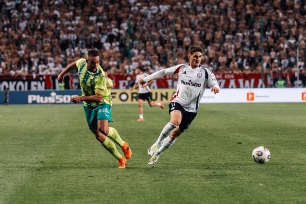 Legia Warszawa v AEK Larnaka - UEFA Europa League Angel Garcia of AEK Larnaka and Ilya Shkurin of Legia Warszawa are seen in action during the 3rd qualifying round match between Legia Warszawa and AEK Larnaka at Marshal Jozef Pilsudski Legia Warsaw Municipal Stadium in Warsaw, Poland, on August 14, 2025. Warsaw Poland  Copyright: xMarekxAntonixIwaÅ czukx originalFilename:iwanczuk-uefaeuro250814_npYKw.jpg