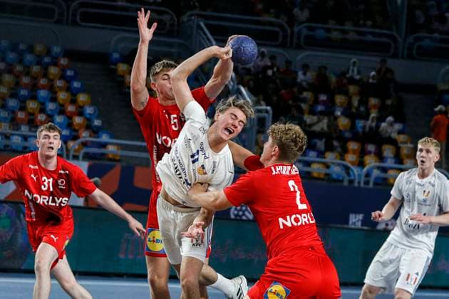 (250815) -- CAIRO, Aug. 15, 2025 -- Andri Erlingsson (C) of Iceland competes during the quarterfinal handball match between Denmark and Iceland at the 11th IHF Men s Youth World Championship, WM, Weltmeisterschaft 2025 in Cairo, Egypt, on Aug. 14, 2025. ) (SP)EGYPT-CAIRO-HANDBALL-MEN S YOUTH WORLD CHAMPIONSHIP-QUARTERFINAL-DENMARK VS ICELAND AhmedxGomaa 