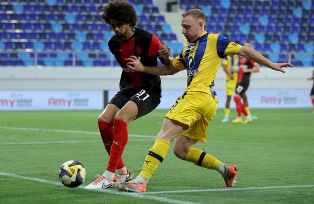 (250815) -- BACKA TOPOLA, Aug. 15, 2025 -- Ido Shahar (R) of Maccabi Tel-Aviv vies with Marcelina Emerson of Hamrun Spartans during the third qualifying round 2nd leg football match between Maccabi Tel-Aviv of Israel and Hamrun Spartans of Malta at the UEFA Europa League in Backa Topola, Serbia, Aug. 14, 2025. (Photo by Xinhua) (SP)SERBIA-BACKA TOPOLA-FOOTBALL-UEFA EUROPA LEAGUE-MACCABI TEL AVIV VS HAMRUN SPARTANS PredragxMilosavljevic 