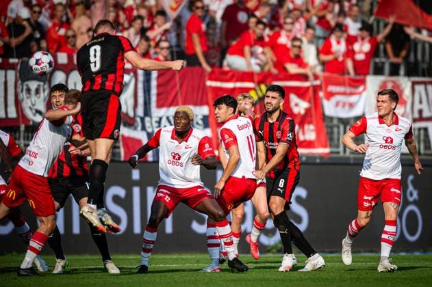 FC Midtjylland v Fredrikstad, UEFA Europa League qualification, Herning, Denmark Herning, Denmark. 14th, August 2025. Martin Erlic (6) of FC Midtjylland and Patrick Metcalfe (11) of Fredrikstad seen during the UEFA Europa League qualification match between FC Midtjylland and Fredrikstad at MCH Arena in Herning. Denmark, Herning  Copyright: xGonzalesxPhoto MortenxKjaerx