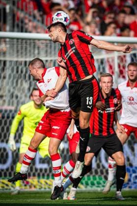 FC Midtjylland v Fredrikstad, UEFA Europa League qualification, Herning, Denmark Herning, Denmark. 14th, August 2025. Adam Gabriel (13) of FC Midtjylland and Simen Rafn (5) of Fredrikstad seen during the UEFA Europa League qualification match between FC Midtjylland and Fredrikstad at MCH Arena in Herning. Denmark, Herning  Copyright: xGonzalesxPhoto MortenxKjaerx