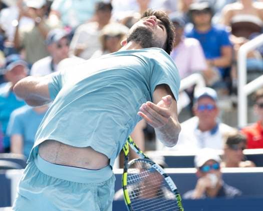 CINCINNATI, OH - AUGUST 15: Carlos Alcaraz (ESP) reaches to serve the ball during the quarter finals in the Cincinnati Open at the Lindner Family Tennis Center on August 15, 2025 in Mason, OH. (Photo by Shelley Lipton Icon Sportswire) TENNIS: AUG 15 Cincinnati Open EDITORIAL USE ONLY Icon2508151343