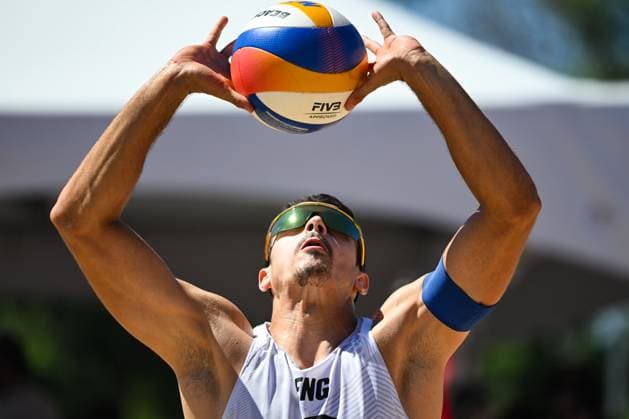 MONTREAL, QC - AUGUST 15: Joaquin Bello (ENG) bumps the ball during a main draw match at Beach Pro Tour Montreal Elite 16 on August 15, 2025 at Parc Jean-Drapeau in Montreal, QC (Photo by David Kirouac Icon Sportswire) VOLLEYBALL: AUG 15 Beach Pro Tour Montreal Elite 16 EDITORIAL USE ONLY Icon250815084