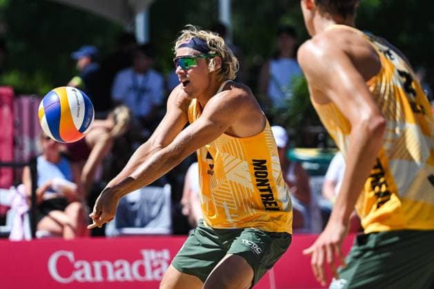 MONTREAL, QC - AUGUST 15: David Ahman (SWE) bumps the ball during a main draw match at Beach Pro Tour Montreal Elite 16 on August 15, 2025 at Parc Jean-Drapeau in Montreal, QC (Photo by David Kirouac Icon Sportswire) VOLLEYBALL: AUG 15 Beach Pro Tour Montreal Elite 16 EDITORIAL USE ONLY Icon250815086