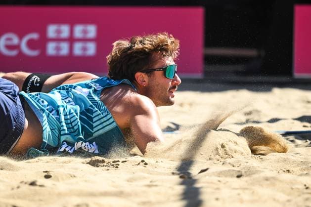 MONTREAL, QC - AUGUST 15: Leo Dillier (SUI) plunges in the sand during a first round match at Beach Pro Tour Montreal Elite 16 on August 15, 2025 at Parc Jean-Drapeau in Montreal, QC (Photo by David Kirouac Icon Sportswire) VOLLEYBALL: AUG 15 Beach Pro Tour Montreal Elite 16 EDITORIAL USE ONLY Icon250815033