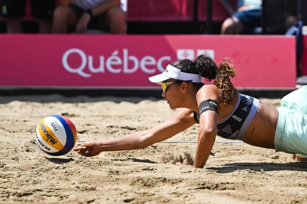 MONTREAL, QC - AUGUST 16: Zoe Verge-Depre (SUI) misses her bump as she plunges during a round of 12 match at Beach Pro Tour Montreal Elite 16 on August 16, 2025 at Parc Jean-Drapeau in Montreal, QC (Photo by David Kirouac Icon Sportswire) VOLLEYBALL: AUG 16 Beach Pro Tour Montreal Elite 16 EDITORIAL USE ONLY Icon250816085