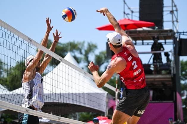 MONTREAL, QC - AUGUST 16: Andrew Benesh (USA) smashes the ball during a round of 12 match at Beach Pro Tour Montreal Elite 16 on August 16, 2025 at Parc Jean-Drapeau in Montreal, QC (Photo by David Kirouac Icon Sportswire) VOLLEYBALL: AUG 16 Beach Pro Tour Montreal Elite 16 EDITORIAL USE ONLY Icon250816054