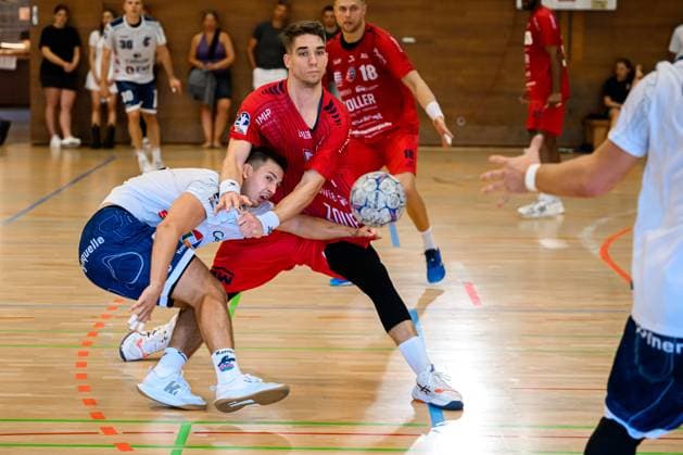Bietigheim HBL 25 26 DHB Pokal SG BBM Bietigheim VfL Potsdam from left in a duel Nikola Vlahovic Bietigheim and Markus Mahr Potsdam Bietigheim Bissingen Halle am Viadukt Baden Württemberg Germany