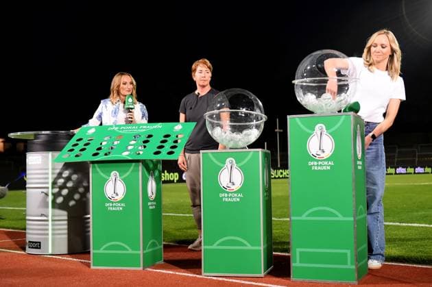 Soccer Womens DFB Cup Season 2025 2026 Borussia Dortmund Borussia Mönchengladbach on 19 08 2025 at Stadion Rote Erde in Dortmund Nele Ocik, left Maren Meinert, center Turid Knaak draw the DFB Cup Womens North Rhine-Westphalia Germany