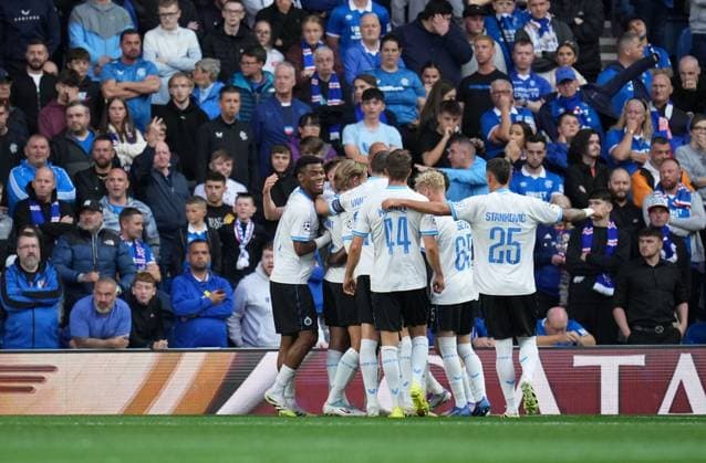Jorne Spileers of Club Brugge celebrates with team mates after scoring to give Brugge a 0-2 lead. Rangers v Club Brugge, UEFA Champions League, Play-Off Round, First Leg, Football, Ibrox Stadium, Glasgow, Scotland, UK - 19 Aug 2025Glasgow Ibrox Stadium Scotland United Kingdom EDITORIAL USE ONLY No use with unauthorised audio, video, data, fixture lists, club league logos or live services. Online in-match use limited to 120 images, no video emulation. No use in betting, games or single club league player publications.  Copyright: xStuartxWallace Shutterstockx 15446679x