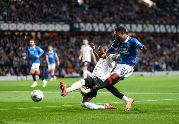 Jayden Meghoma of Rangers crosses the ball beyond Carlos Forbs of Club Brugge for Danilo of Rangers to score and reduce Club Brugge s lead to 1-3. Rangers v Club Brugge, UEFA Champions League, Play-Off Round, First Leg, Football, Ibrox Stadium, Glasgow, Scotland, UK - 19 Aug 2025Glasgow Ibrox Stadium Scotland United Kingdom EDITORIAL USE ONLY No use with unauthorised audio, video, data, fixture lists, club league logos or live services. Online in-match use limited to 120 images, no video emulation. No use in betting, games or single club league player publications. Copyright: xStuartxWallace Shutterstockx 15446679bd
