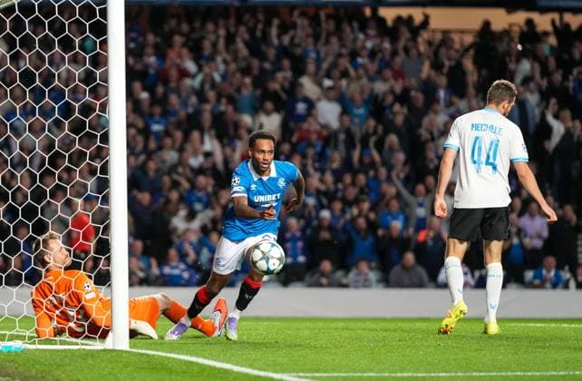 Danilo of Rangers to scores past Club Brugge goalkeeper Simon Mignolet to reduce Club Brugge s lead to 1-3. Rangers v Club Brugge, UEFA Champions League, Play-Off Round, First Leg, Football, Ibrox Stadium, Glasgow, Scotland, UK - 19 Aug 2025Glasgow Ibrox Stadium Scotland United Kingdom EDITORIAL USE ONLY No use with unauthorised audio, video, data, fixture lists, club league logos or live services. Online in-match use limited to 120 images, no video emulation. No use in betting, games or single club league player publications. Copyright: xStuartxWallace Shutterstockx 15446679bg