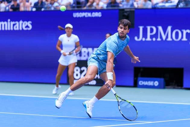 August 19, 2025, Flushing Meadows, New York, USA: Emma Raducanu and Carlos Alcaraz (in photo) during a mix doubles match against Jessica Pegula and Jack Draper at the 2025 US Open at USTA Billie Jean King National Tennis Center on Tuesday August 19, 2025 in the Flushing neighborhood of the Queens borough of New York City. JAVIER ROJAS PI Flushing Meadows USA - ZUMAp124 20250819_zaa_p124_060 Copyright: xJavierxRojasx