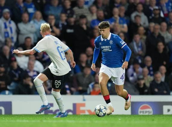 Mikey Moore of Rangers runs at Joaquin Seys of Club Brugge Rangers v Club Brugge, UEFA Champions League, Play-Off Round, First Leg, Football, Ibrox Stadium, Glasgow, Scotland, UK - 19 Aug 2025Glasgow Ibrox Stadium Scotland United Kingdom EDITORIAL USE ONLY No use with unauthorised audio, video, data, fixture lists, club league logos or live services. Online in-match use limited to 120 images, no video emulation. No use in betting, games or single club league player publications. Copyright: xStuartxWallace Shutterstockx 15446679dw