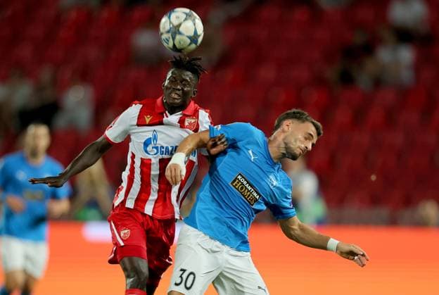 (250820) -- BELGRADE, Aug. 20, 2025 -- Mahmudu Bajo (L) of Crvena Zvezda vies with Vlad Dragomir of Pafos during the UEFA Champions League play-offs 1st leg football match between Crvena Zvezda and Pafos in Belgrade, Serbia, on Aug. 19, 2025. (Photo by Xinhua) (SP)SERBIA-BELGRADE-FOOTBALL-UEFA CHAMPIONS LEAGUE-PLAY-OFFS-CRVENA ZVEZDA VS PAFOS PredragxMilosavljevic 