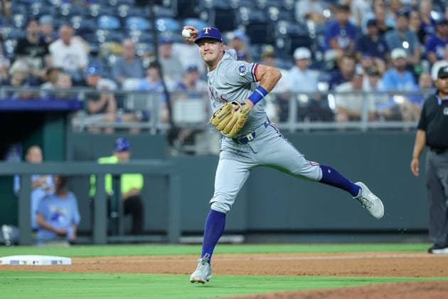 August 19, 2025: Texas Rangers third baseman Josh Jung (6) throws to first during the seventh inning of a baseball game against the Kansas City Royals at Kauffman Stadium in Kansas City, MO. CSM Kansas City United States of America - ZUMAc04_ 20250819_zma_c04_057 Copyright: xDavidxSmithx