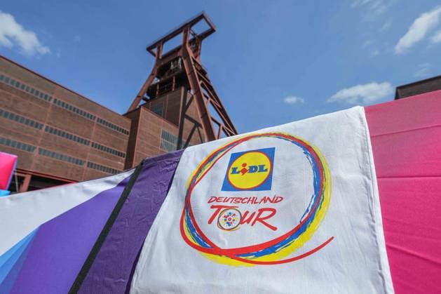 Cycling UCI ProSeries Men Elite Deutschland Tour 2025 Prologue on 20 08 2025 on the grounds of Zeche Zollverein in Essen Logo of the Deutschland Tour in front of the winding tower of Zeche Zollverein xJRx