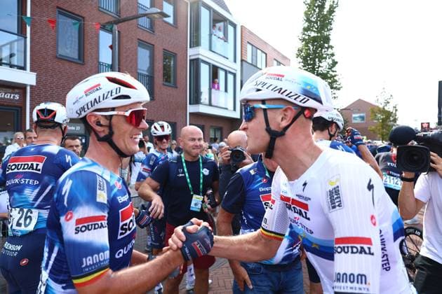 Belgian Tim Merlier of Soudal Quick-Step (R) celebrates with a teammate after winning the first stage of the Renewi Tour multi-stage cycling race, from Terneuzen to Breskens, The Netherlands (182,7 km) on Wednesday 20 August 2025. The five-day race takes place in Belgium and the Netherlands. DAVIDxPINTENS  x131649880x
