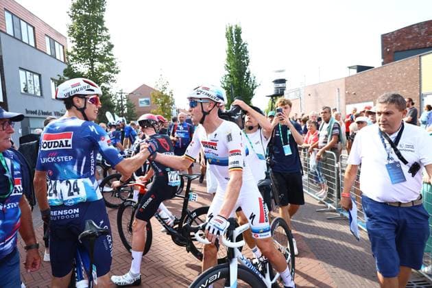 Belgian Tim Merlier of Soudal Quick-Step (C) celebrates with a teammate after winning the first stage of the Renewi Tour multi-stage cycling race, from Terneuzen to Breskens, The Netherlands (182,7 km) on Wednesday 20 August 2025. The five-day race takes place in Belgium and the Netherlands. DAVIDxPINTENS  x131650484x