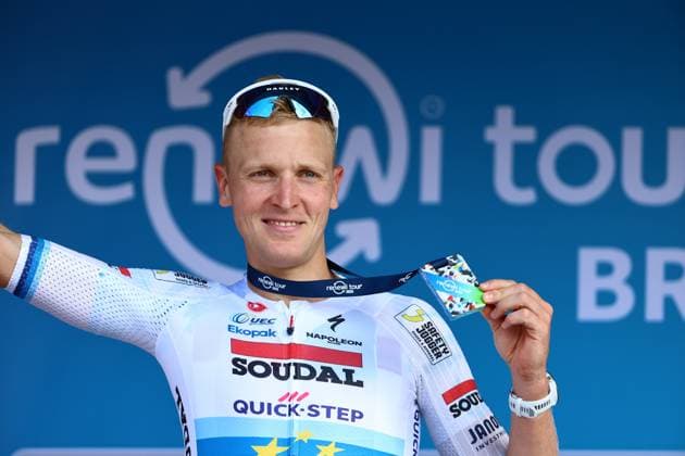 Belgian Tim Merlier of Soudal Quick-Step celebrates on the podium after winning the first stage of the Renewi Tour multi-stage cycling race, from Terneuzen to Breskens, The Netherlands (182,7 km) on Wednesday 20 August 2025. The five-day race takes place in Belgium and the Netherlands. DAVIDxPINTENS  x131652668x