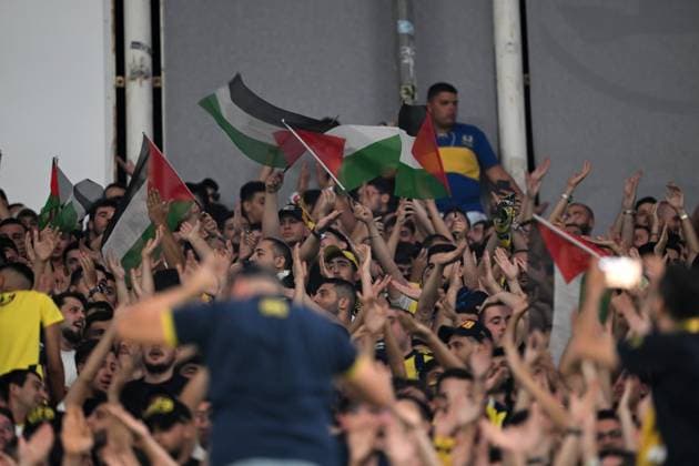 Fenerbahce v Benfica - UEFA Champions League ISTANBUL, TURKIYE - AUGUST 20: Fenerbahce fans unfurl Palestinian flag ahead of the UEFA Champions League play-off round 1st leg match between Fenerbahce and Benfica at Chobani Stadium on August 20, 2025 in Istanbul, Turkiye. Ali Atmaca Anadolu Istanbul Turkey. Editorial use only. Please get in touch for any other usage.  Copyright: x2025xAnadoluxAlixAtmacax