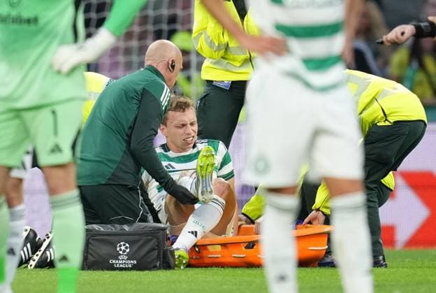 Alistair Johnston of Celtic is helped on to a stretcher before being carried off the pitch injured and substituted for Anthony Ralston of Celtic. Celtic v Kairat Almaty, UEFA Champions League, Play-Off Round, First Leg, Football, Celtic Park, Glasgow, Scotland, UK - 20 Aug 2025Glasgow Celtic Park Scotland United Kingdom EDITORIAL USE ONLY No use with unauthorised audio, video, data, fixture lists, club league logos or live services. Online in-match use limited to 120 images, no video emulation. No use in betting, games or single club league player publications.  Copyright: xStuartxWallace Shutterstockx 15446684ac