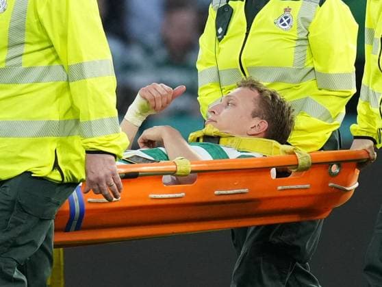 Alistair Johnston of Celtic is carried off the pitch on a stretcher injured and substituted for Anthony Ralston of Celtic. Celtic v Kairat Almaty, UEFA Champions League, Play-Off Round, First Leg, Football, Celtic Park, Glasgow, Scotland, UK - 20 Aug 2025Glasgow Celtic Park Scotland United Kingdom EDITORIAL USE ONLY No use with unauthorised audio, video, data, fixture lists, club league logos or live services. Online in-match use limited to 120 images, no video emulation. No use in betting, games or single club league player publications.  Copyright: xStuartxWallace Shutterstockx 15446684ad