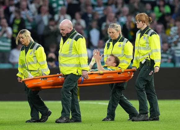 Alistair Johnston of Celtic is carried off the pitch on a stretcher injured and substituted for Anthony Ralston of Celtic. Celtic v Kairat Almaty, UEFA Champions League, Play-Off Round, First Leg, Football, Celtic Park, Glasgow, Scotland, UK - 20 Aug 2025Glasgow Celtic Park Scotland United Kingdom EDITORIAL USE ONLY No use with unauthorised audio, video, data, fixture lists, club league logos or live services. Online in-match use limited to 120 images, no video emulation. No use in betting, games or single club league player publications.  Copyright: xStuartxWallace Shutterstockx 15446684aj