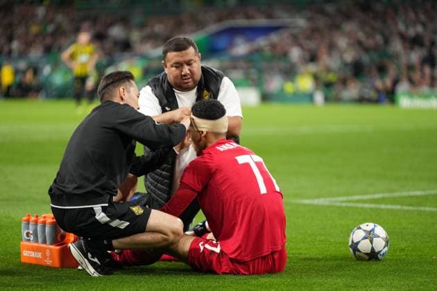 Kairat Almaty goalkeeper Temirlan Anarbekov receiving treatment for a cut on his head caused in a clash with Shin Yamada of Celtic. Celtic v Kairat Almaty, UEFA Champions League, Play-Off Round, First Leg, Football, Celtic Park, Glasgow, Scotland, UK - 20 Aug 2025Glasgow Celtic Park Scotland United Kingdom EDITORIAL USE ONLY No use with unauthorised audio, video, data, fixture lists, club league logos or live services. Online in-match use limited to 120 images, no video emulation. No use in betting, games or single club league player publications.  Copyright: xStuartxWallace Shutterstockx 15446684be