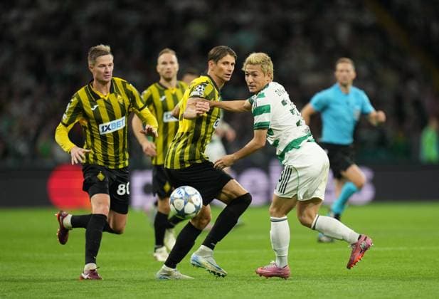 Kairat Almaty captain Aleksandr Martynovich & Daizen Maeda of Celtic Celtic v Kairat Almaty, UEFA Champions League, Play-Off Round, First Leg, Football, Celtic Park, Glasgow, Scotland, UK - 20 Aug 2025Glasgow Celtic Park Scotland United Kingdom EDITORIAL USE ONLY No use with unauthorised audio, video, data, fixture lists, club league logos or live services. Online in-match use limited to 120 images, no video emulation. No use in betting, games or single club league player publications.  Copyright: xStuartxWallace Shutterstockx 15446684dk