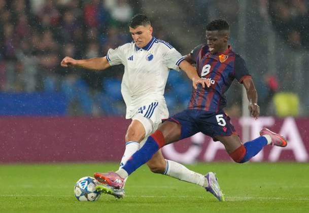 August 20, 2025, Basel, Switzerland: FC Copenhagen midfielder MOHAMED ELYOUNOUSSI (10) works against FC Basel 1893 midfielder METINHO (5) during the UEFA Champions League Playoff match between FC Basel 1893 and FC Copenhagen on August 20, 2025, in Basel, Switzerland. The match finished a 1-1 draw. Basel Switzerland - ZUMAc201 20250820_zap_c201_058 Copyright: xScottxColemanx