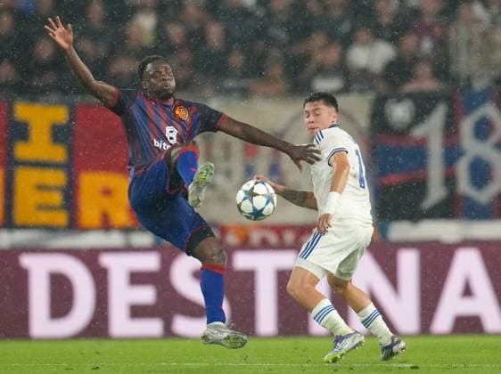 August 20, 2025, Basel, Switzerland: FC Basel 1893 midfielder PHILIP OTELE (7) works against FC Copenhagen midfielder RODRIGO HUESCAS (13) during the UEFA Champions League Playoff match between FC Basel 1893 and FC Copenhagen on August 20, 2025, in Basel, Switzerland. The match finished a 1-1 draw. Basel Switzerland - ZUMAc201 20250820_zap_c201_074 Copyright: xScottxColemanx