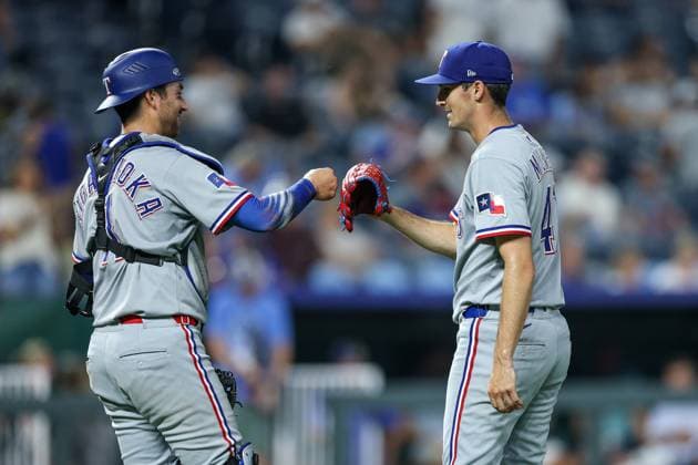 August 20, 2025: Texas Rangers catcher Kyle Higashioka (11) and relief pitcher Hoby Milner (41) react after their win over the Kansas City Royals in a baseball game at Kauffman Stadium in Kansas City, MO. CSM Kansas City United States of America - ZUMAc04_ 20250820_zma_c04_075 Copyright: xDavidxSmithx