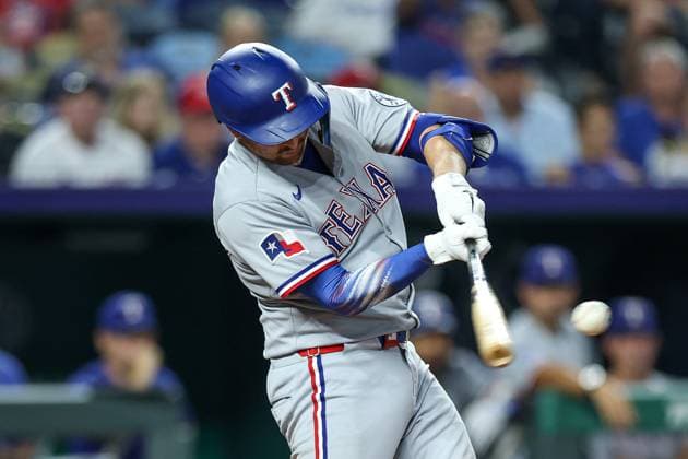 August 20, 2025: Texas Rangers catcher Kyle Higashioka (11) hits a three RBI double during the ninth inning of a baseball game against the Kansas City Royals at Kauffman Stadium in Kansas City, MO. CSM Kansas City United States of America - ZUMAc04_ 20250820_zma_c04_078 Copyright: xDavidxSmithx