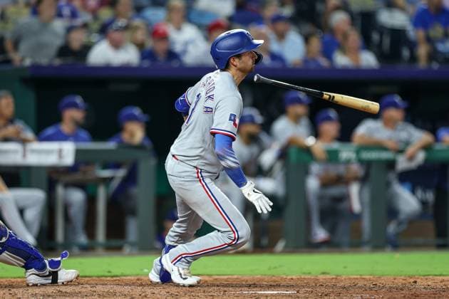 August 20, 2025: Texas Rangers catcher Kyle Higashioka (11) hits a three RBI double during the ninth inning of a baseball game against the Kansas City Royals at Kauffman Stadium in Kansas City, MO. CSM Kansas City United States of America - ZUMAc04_ 20250820_zma_c04_079 Copyright: xDavidxSmithx