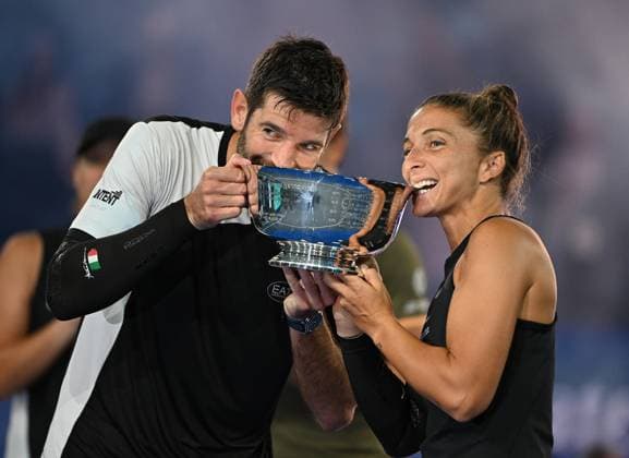 Sara Errani and Andrea Vavassori pose with the Championship Trophy after defeating Iga Swiatek, Casper Ruud during the Mixed Doubles Final on Arthur Ashe Stadium at the 2025 US Open Tennis Championship at the USTA Billie Jean King National Tennis Center in New York City on Wednesday, August 20, 2025 in New York City.  NYP20250820521 LarryxMarano