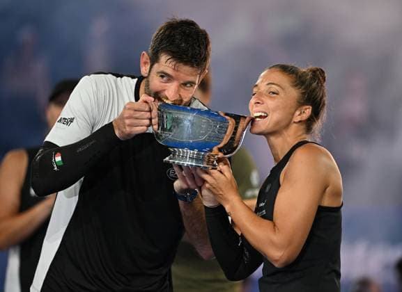 Sara Errani and Andrea Vavassori pose with the Championship Trophy after defeating Iga Swiatek, Casper Ruud during the Mixed Doubles Final on Arthur Ashe Stadium at the 2025 US Open Tennis Championship at the USTA Billie Jean King National Tennis Center in New York City on Wednesday, August 20, 2025 in New York City.  NYP20250820523 LarryxMarano