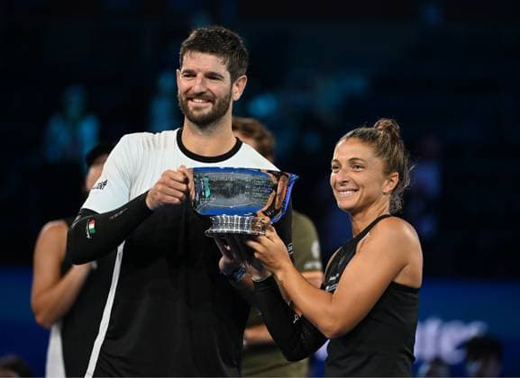 Sara Errani and Andrea Vavassori pose with the Championship Trophy after defeating Iga Swiatek, Casper Ruud during the Mixed Doubles Final on Arthur Ashe Stadium at the 2025 US Open Tennis Championship at the USTA Billie Jean King National Tennis Center in New York City on Wednesday, August 20, 2025 in New York City.  NYP20250820524 LarryxMarano