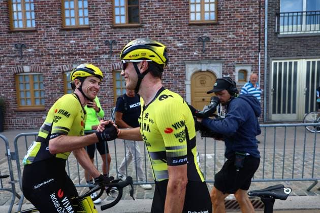 Dutch Olav Kooij of Team Visma-Lease a Bike is congratulated by Italian Edoardo Affini of Team Visma-Lease a Bike after winning the second stage of the Renewi Tour multi-stage cycling race, from Blankenberge to Ardooie (169,4 km) on Thursday 21 August 2025. The five-day race takes place in Belgium and the Netherlands. DAVIDxPINTENS  x131769843x