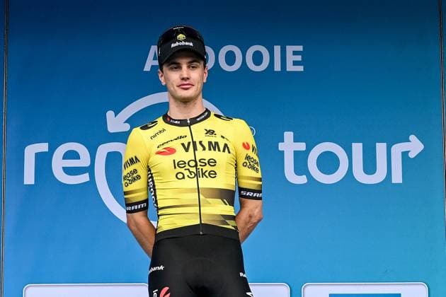 Dutch Olav Kooij of Team Visma-Lease a Bike celebrates on the podium after winning the second stage of the Renewi Tour multi-stage cycling race, from Blankenberge to Ardooie (169,4 km) on Thursday 21 August 2025. The five-day race takes place in Belgium and the Netherlands. DAVIDxPINTENS  x131780223x