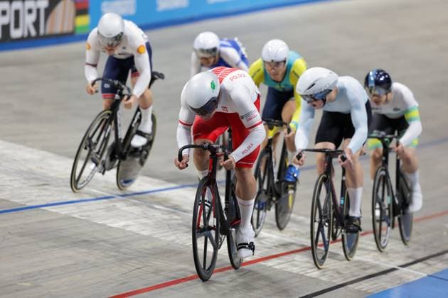 2025 UCI Junior Track World Championships Picture by Alex Whitehead SWpix.com - 21 08 2025 - Cycling - 2025 UCI Junior Track World Championships - Omnisport, Apeldoorn, Netherlands - Men Keirin 1 2 Finals - Tomasz Lamaszewski (Poland), Dmitrii Pavlovskii (Athlete Individual Neutral) Copyright: x xSWpix.comx(t axPhotographyxHubxLtd)xAlexxWhitehead SWpix.comx SWP-3030-0819