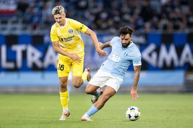 250821 Filip Slavicek of SK Sigma Olomouc and Sead Haksabanovic of Malmö FF during the first leg UEFA Europa League playoff football match between Malmö FF and SK Sigma Olomouc on August 21, 2025 in Malmö Photo Petter Arvidson BILDBYRAN kod PA PA1067 fotboll football soccer fotball uefa europa league europa league malmö ff sk sigma olomouc bbeng playoff bbauto  Copyright: PETTERxARVIDSON BB250821PA081